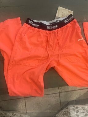 Grey's Anatomy  Neon Orange Drawstring Scrub flare coral